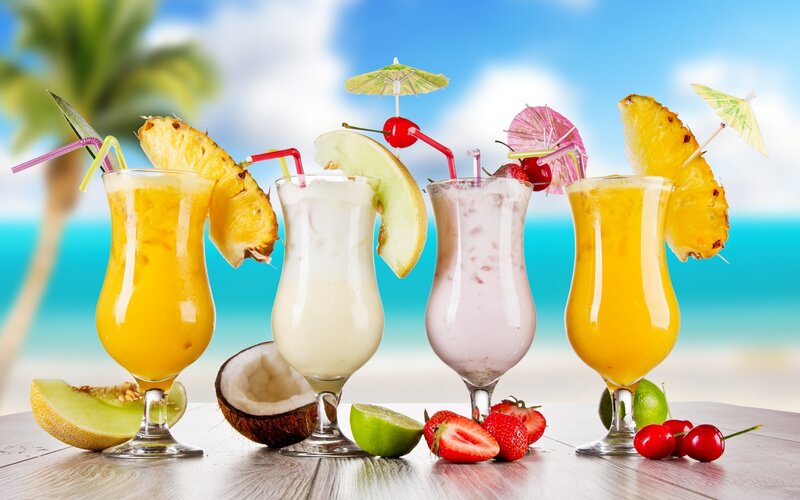 Tropical Drinks on Beach — Blue, Relaxed, Afternoon, Photograph, Pineapple, Strawberry, Coconut, Cherry