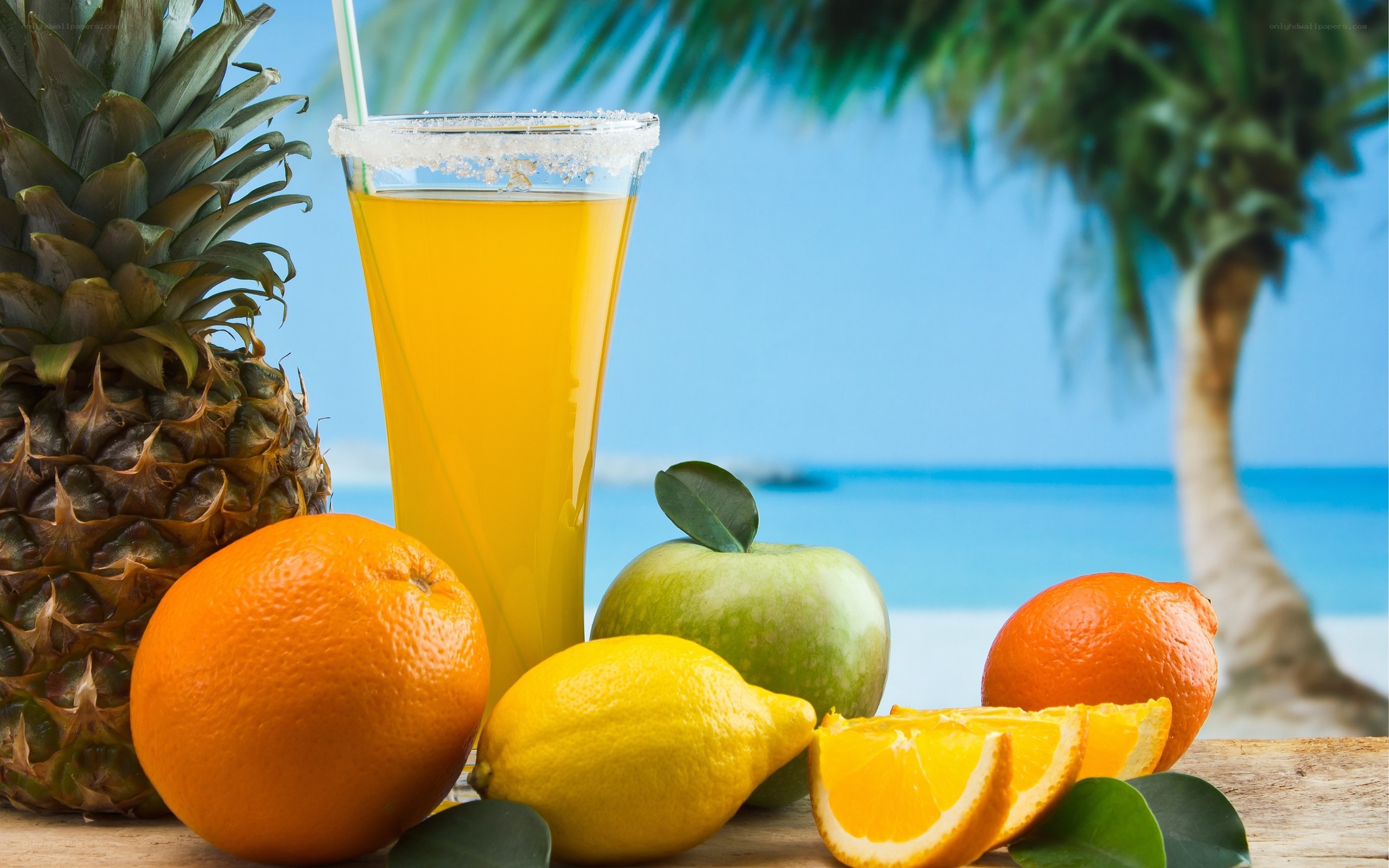 tropical fruit juice on beach