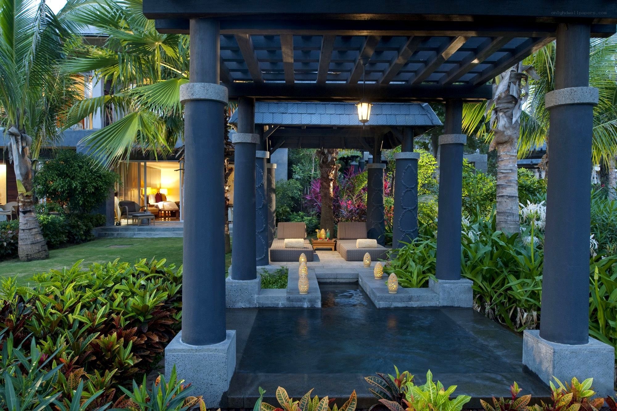 tropical garden pavilion at dusk