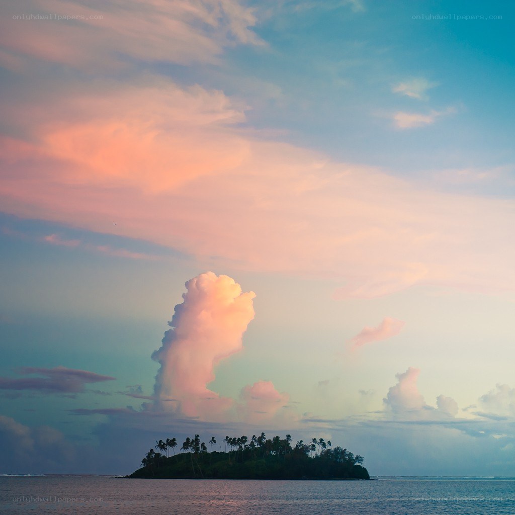 tropical island at sunset