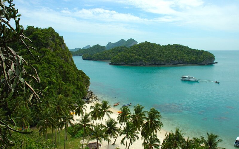 tropical island bay with boats