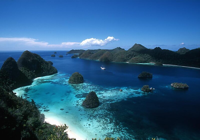 tropical island bay with coral reefs
