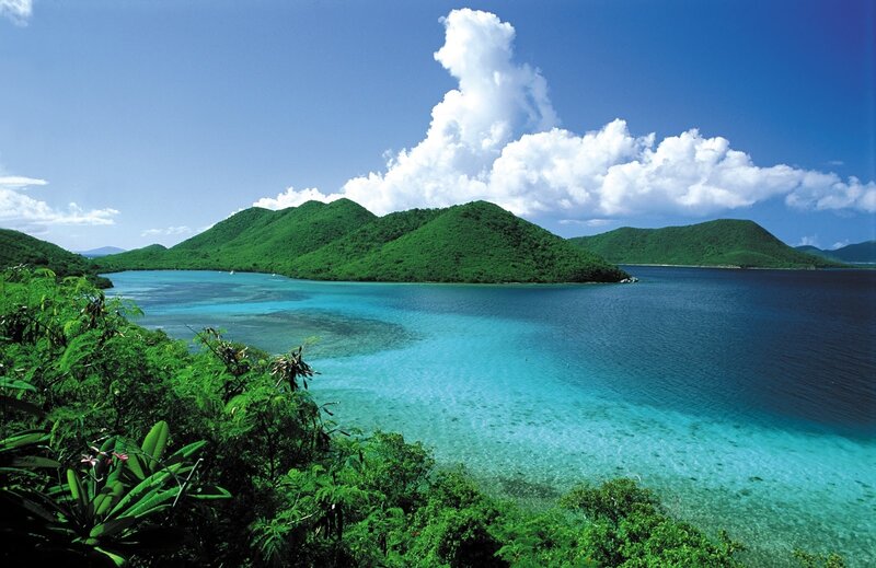 tropical island bay with green hills
