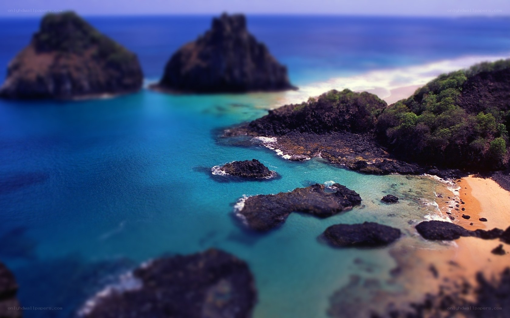 tropical island bay with rocks