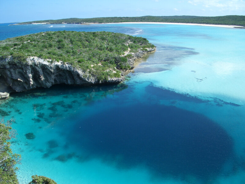 tropical island cove with clear water
