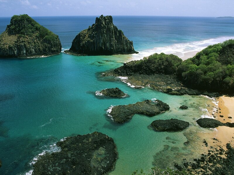 tropical island cove with rock formations