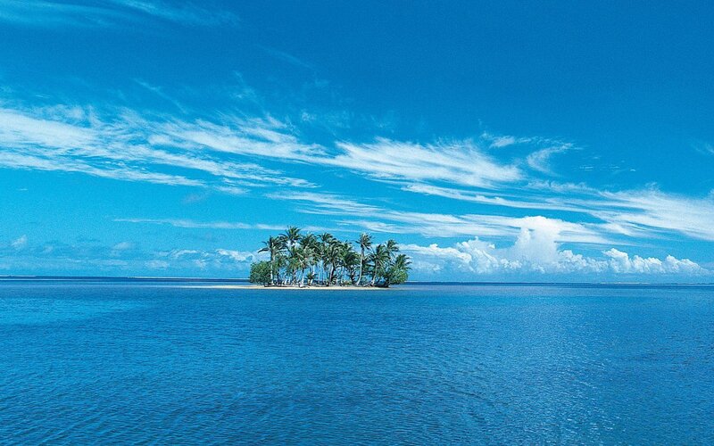 tropical island in blue ocean