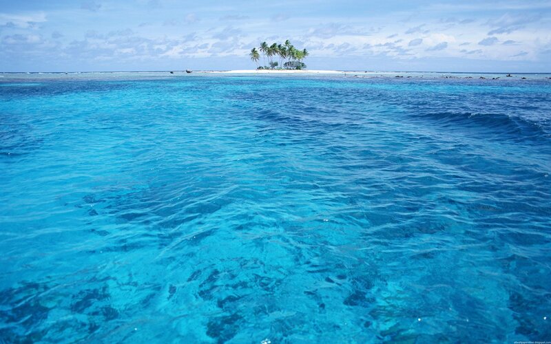 tropical island in blue ocean