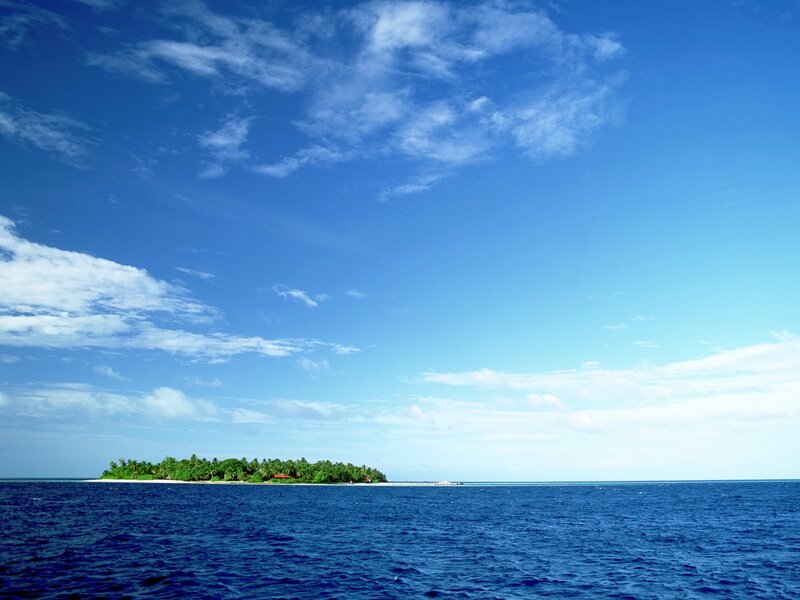 Tropical island in blue ocean