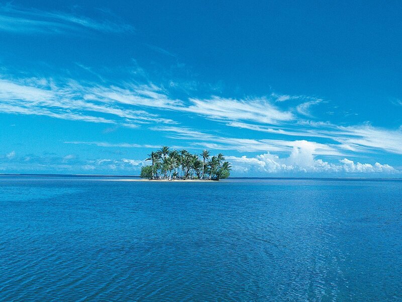 tropical island in blue ocean