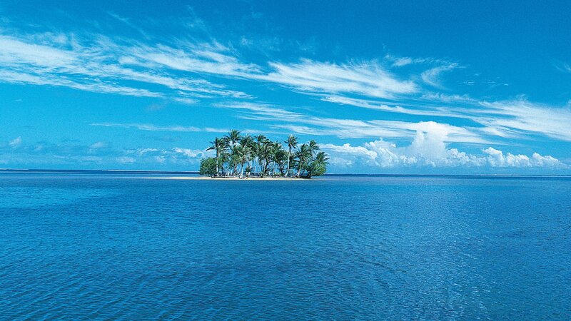 tropical island in blue ocean