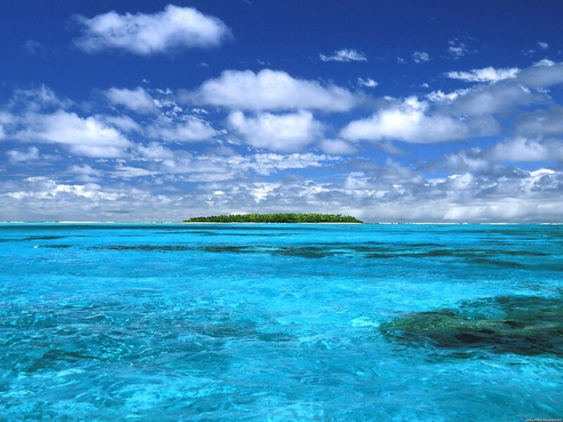 Tropical island in clear blue water