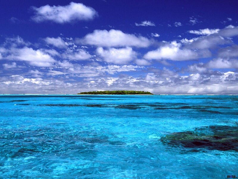 Tropical island in clear blue water
