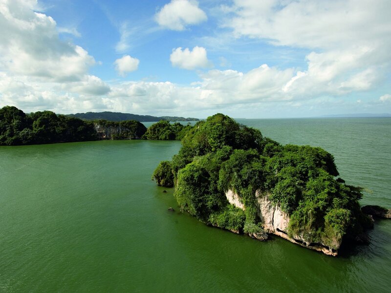 tropical island in green water