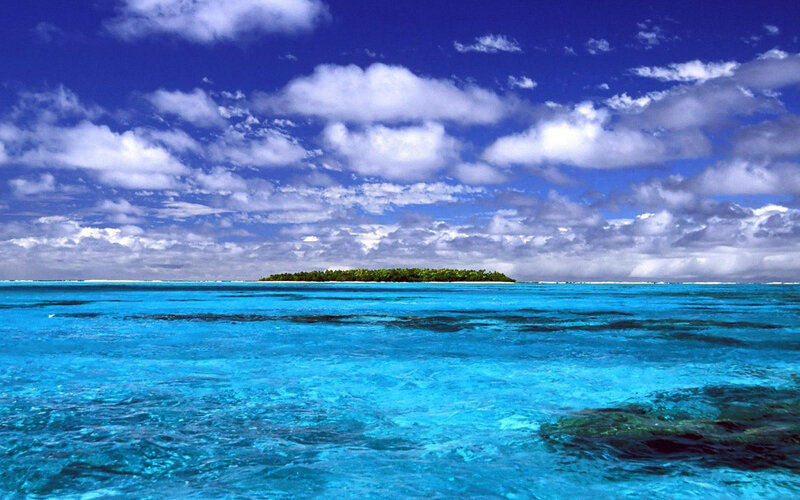 Tropical Island in Ocean — Blue, Serene, Afternoon, Photograph, Sky, Clouds, White