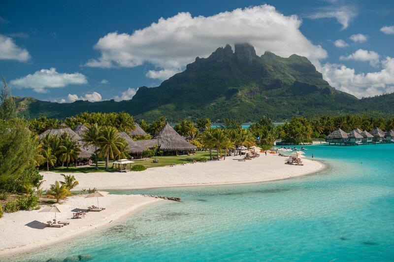 Tropical Island Resort — Blue, Serene, Afternoon, Photograph, Mountain, Palm Trees, Beach Huts
