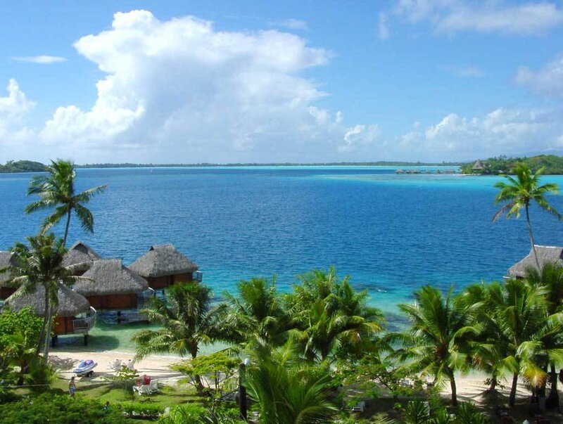 Tropical island resort with overwater bungalows