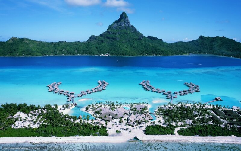 Tropical island resort with overwater bungalows