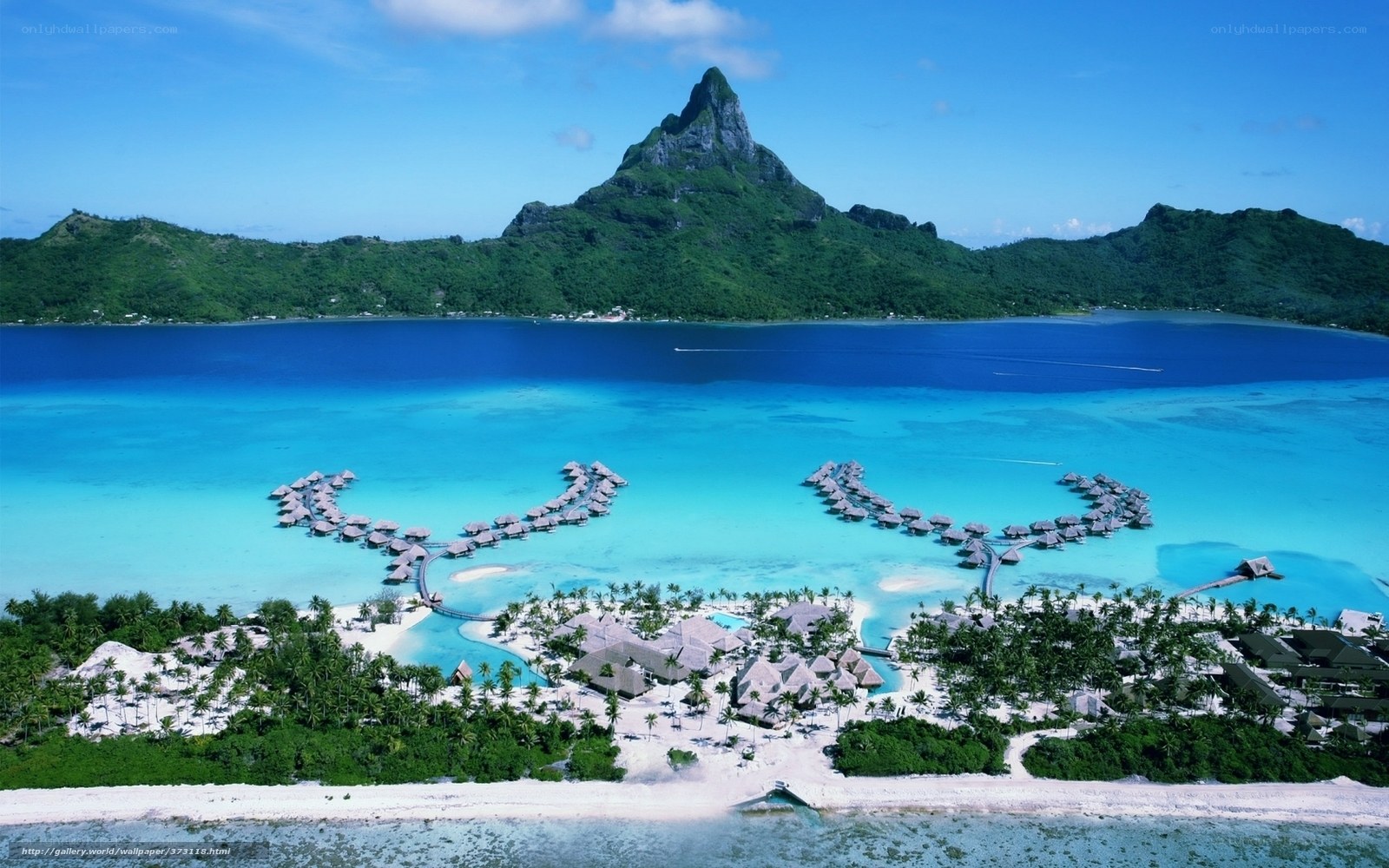 Tropical island resort with overwater bungalows