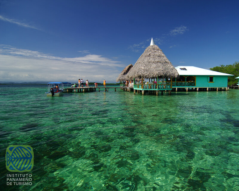 Tropical island resort with thatched hut