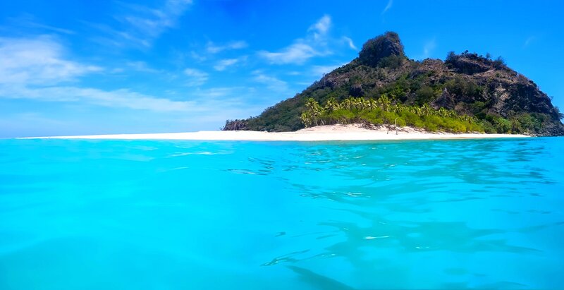 Tropical Island with Beach — Blue, Serene, Afternoon, Photograph, Mountain