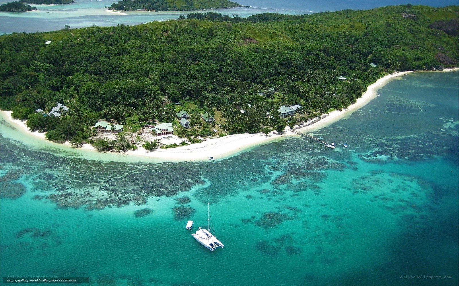 tropical island with catamaran