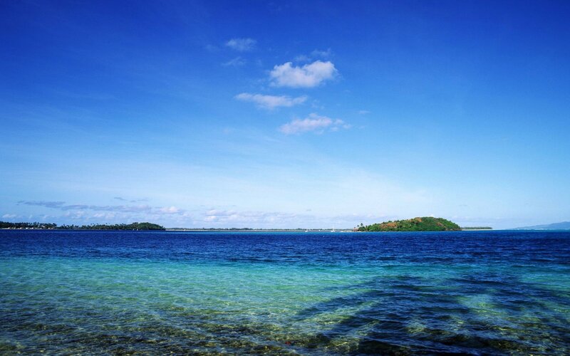 tropical island with clear blue water
