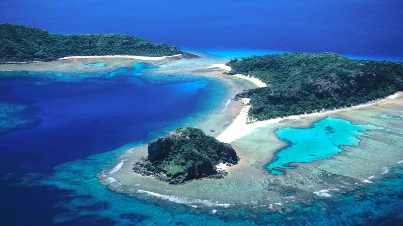 tropical island with coral reef