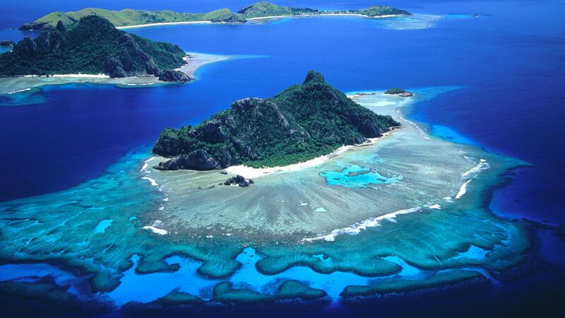 tropical island with coral reef