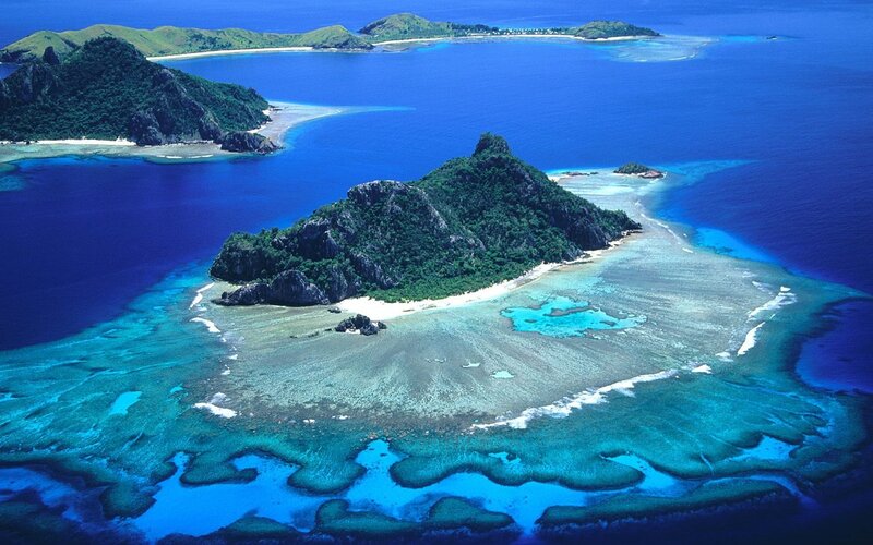 tropical island with coral reef