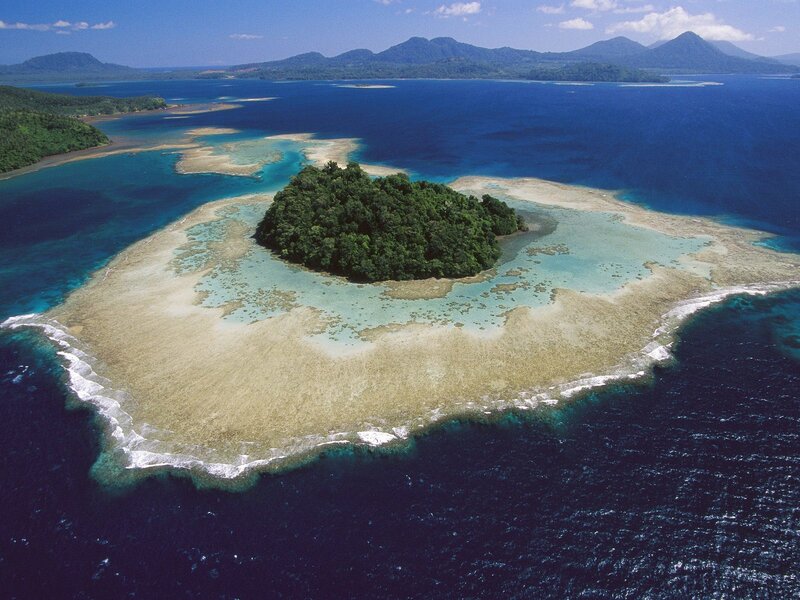 tropical island with coral reef