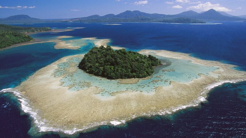 tropical island with coral reef