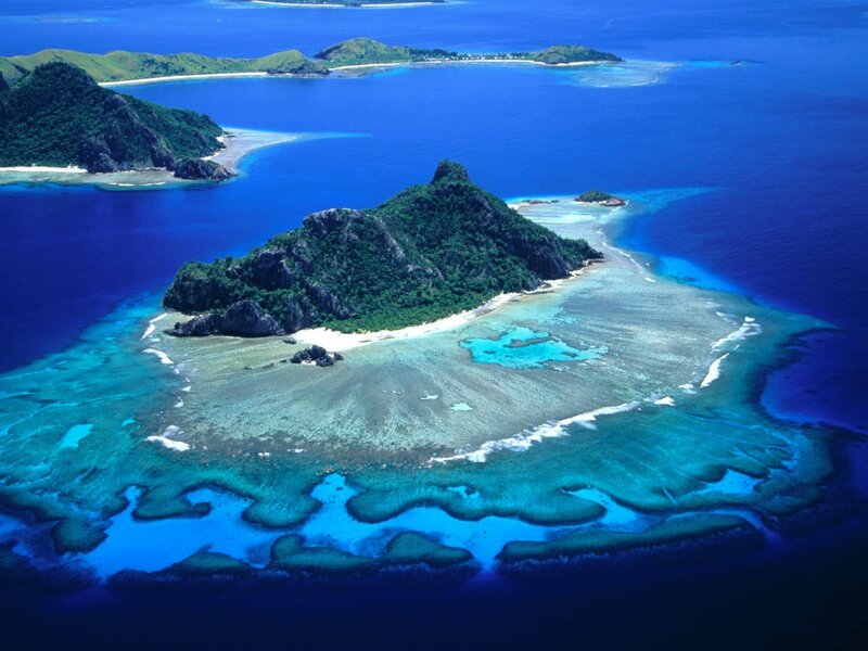 tropical island with coral reef