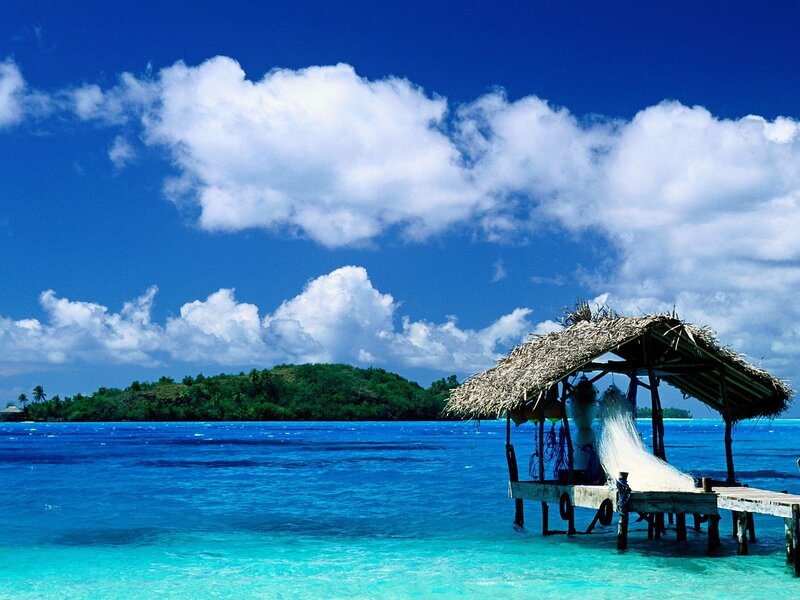Tropical island with fishing hut