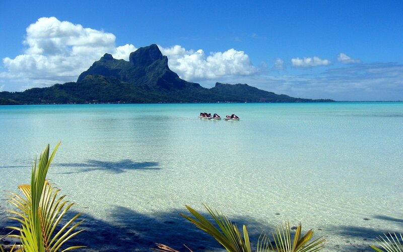 tropical island with jet skis