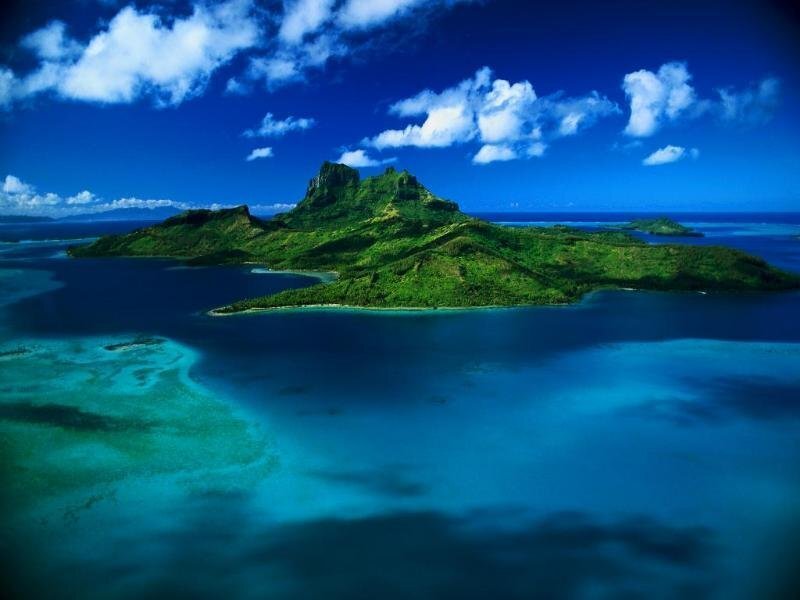tropical island with lush green mountains