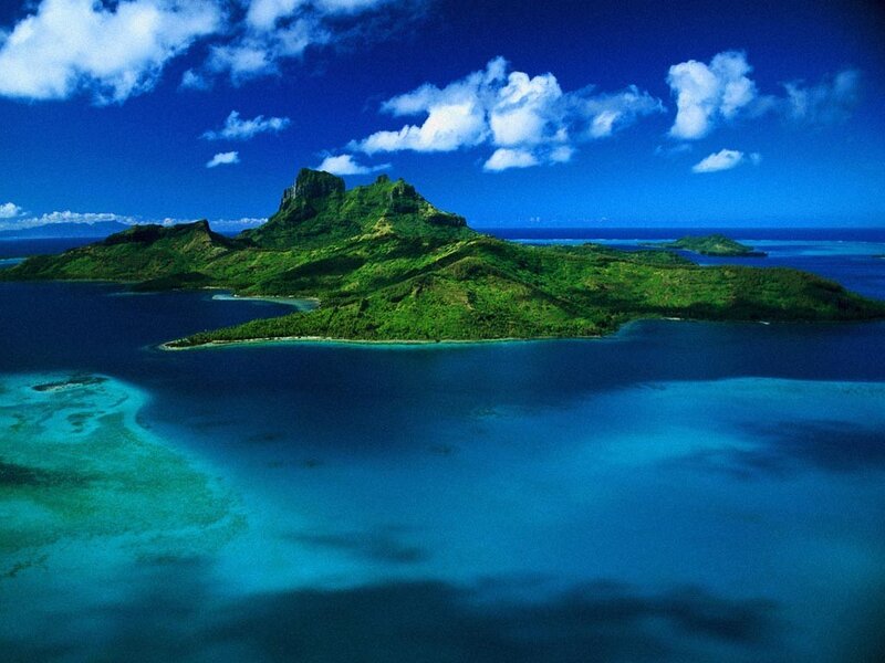 tropical island with lush green mountains