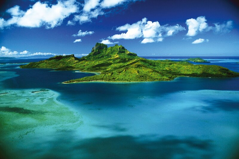 tropical island with lush green mountains