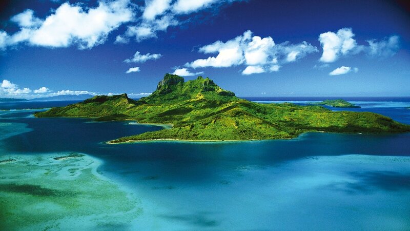 tropical island with lush green mountains