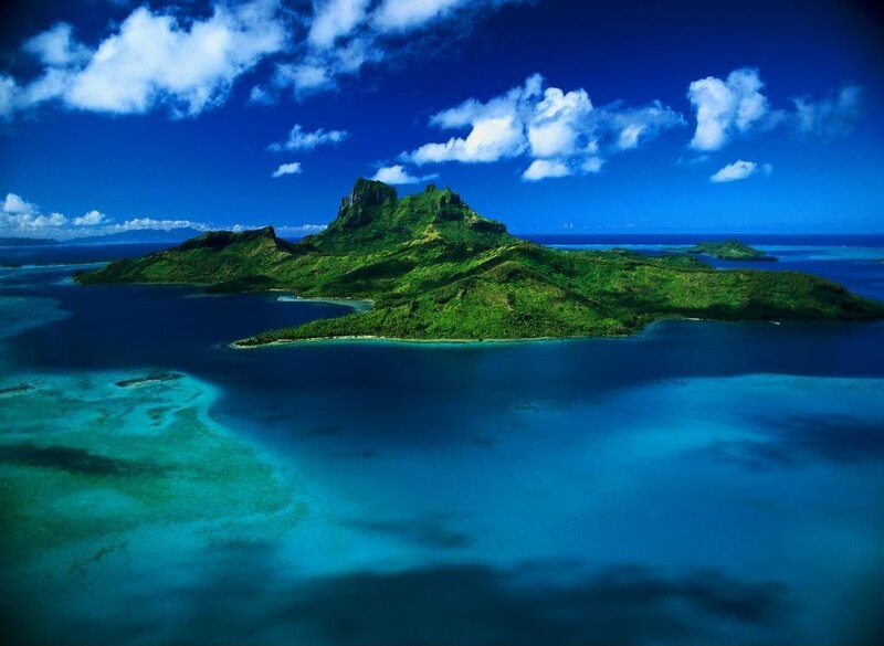 tropical island with lush green mountains