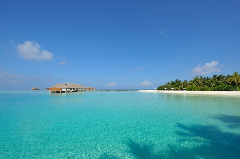 Tropical island with overwater bungalows