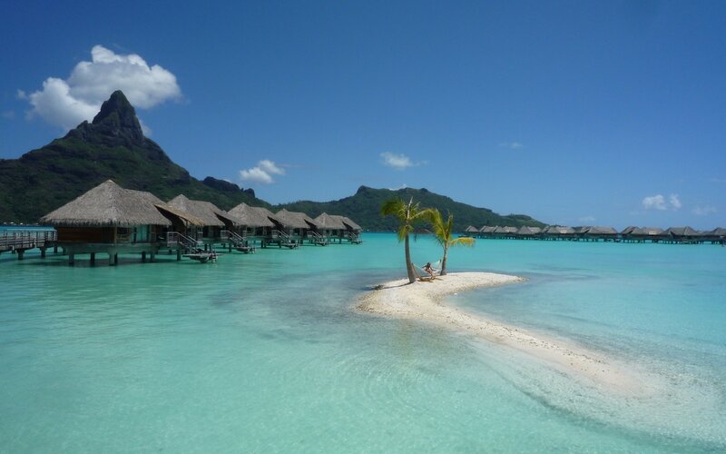 Tropical island with overwater bungalows