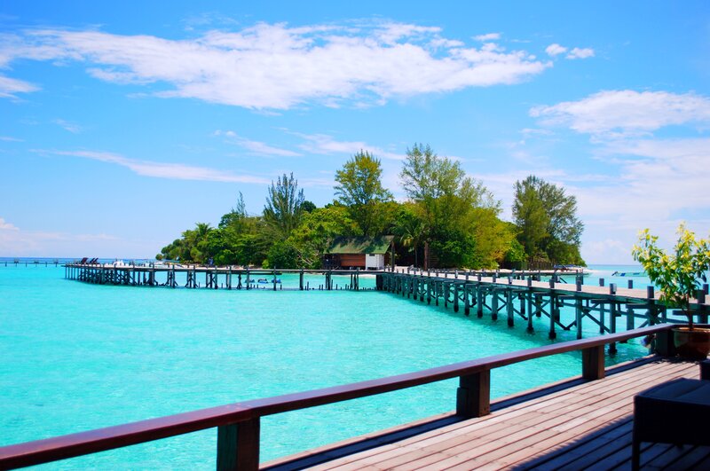 Tropical Island with Pier — Blue, Serene, Afternoon, Photograph, Trees