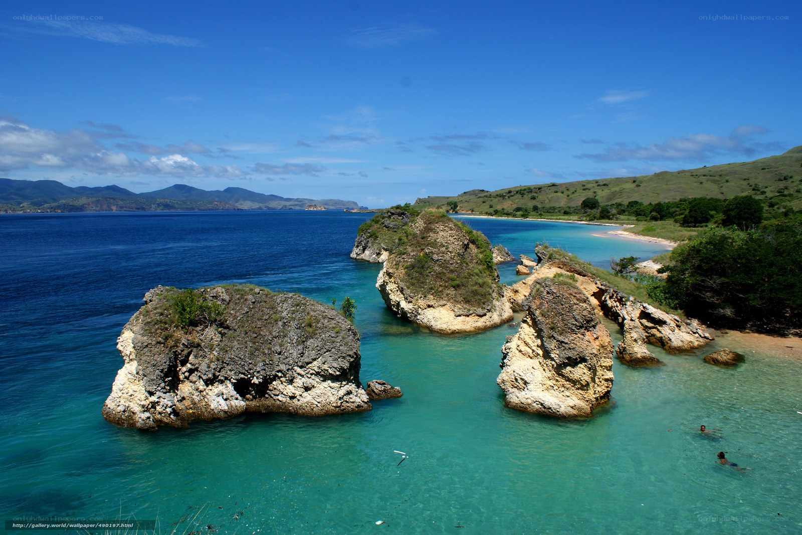 tropical island with rocky outcrops