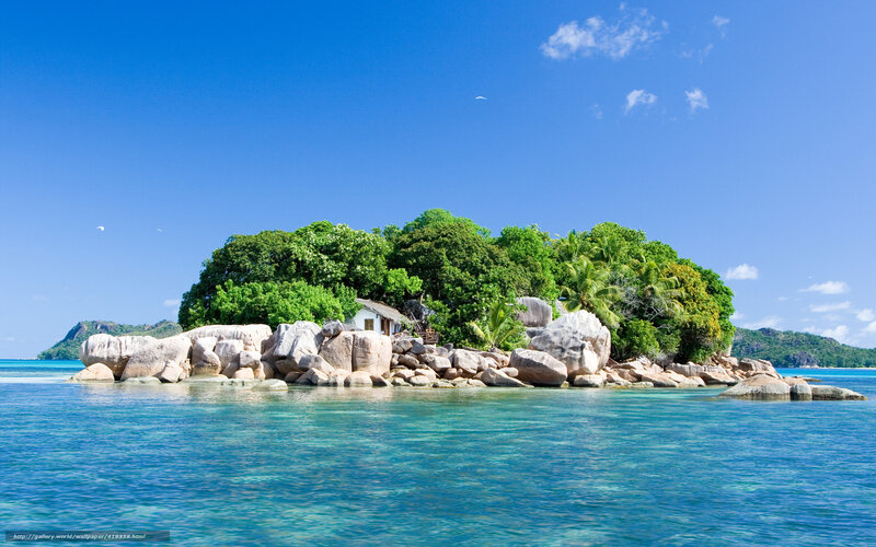 Tropical island with rocky shore
