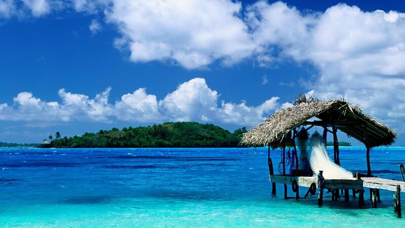 Tropical island with thatched hut