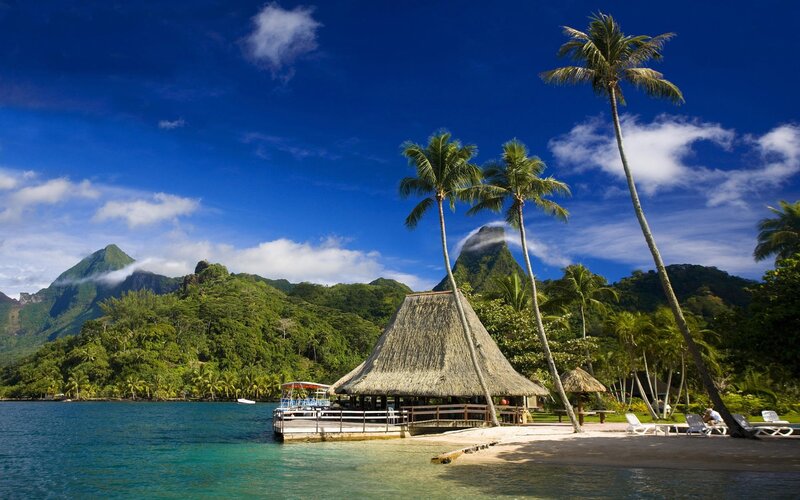 Tropical island with thatched hut