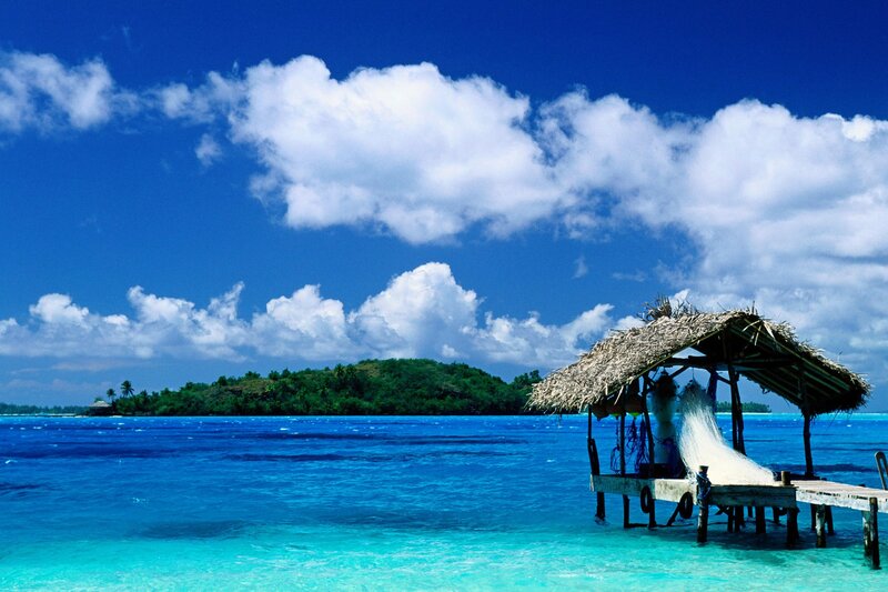 Tropical island with thatched hut