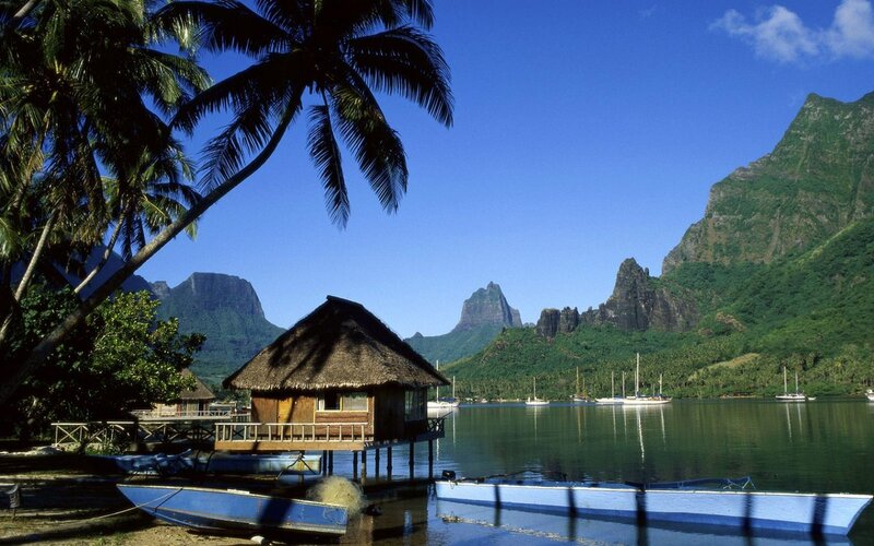 Tropical island with thatched hut