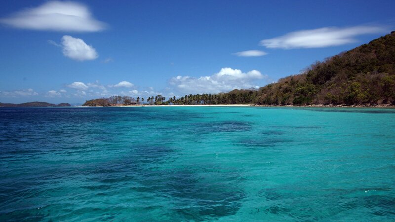 tropical island with turquoise water